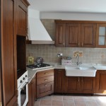 Photo of completed kitchen in dark hardwood