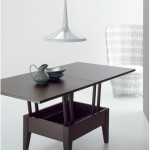Piccolo tavolo alzabile ed allungabile in legno marrone