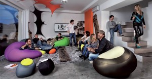 People sat on expandpouf sofas in a house